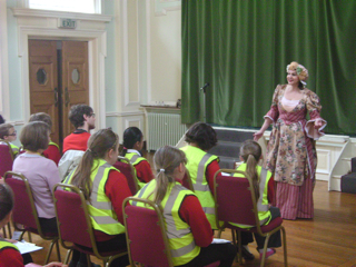 Silva McQueen with schoolchildren